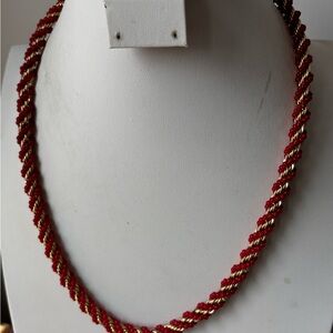Gold tone & cherry red necklace/ seed beads/ measures 22 in total length